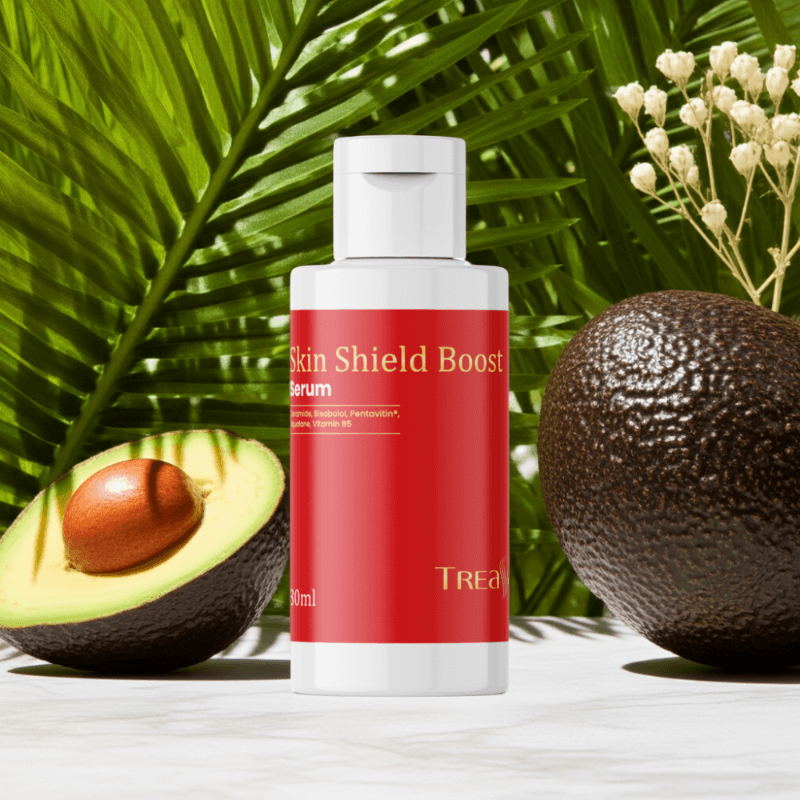 Treasure9 vitamin C Skin Barrier, Skin barrier serum bottle with dropper on a white surface with avocados and green leaves